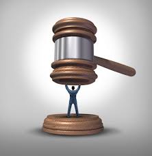 Gavel crushing person.