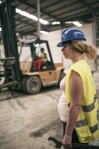 Pregnant construction worker.