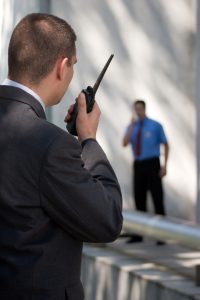 Security guards discussing anti-violence training. 